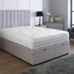 Apollo Ottoman Bed with dense vertical-lined headboard by Dreamcraft Furniture