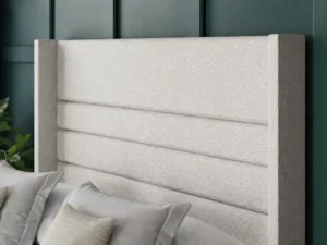 Paris Ottoman Bed with horizontal-lined floor-standing wing headboard by Dreamcraft Furniture