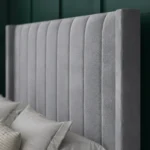 Amelia Wing Ottoman Bed with floor-standing headboard by Dreamcraft Furniture