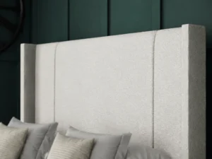 Porto Ottoman Bed with two-line floor-standing wing headboard by Dreamcraft Furniture