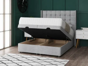 Omega Ottoman Bed with geometric buttoned floor-standing wing headboard by Dreamcraft Furniture