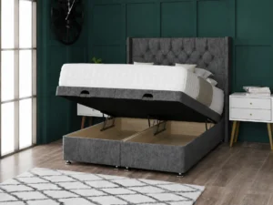 Chesterfield Ottoman Bed with diamond-tufted floor-standing wing headboard by Dreamcraft Furniture