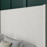 Jane Ottoman Bed with minimalist floor-standing wing headboard by Dreamcraft Furniture