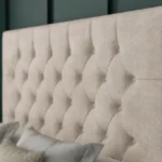 Chesterfield Ottoman Bed with diamond-tufted headboard by Dreamcraft Furniture